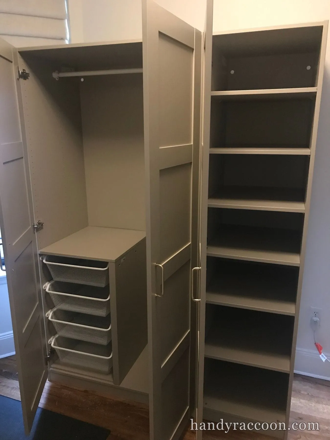 Open taupe wardrobes showing a clothes rail, white mesh basket drawers and adjustable shelving