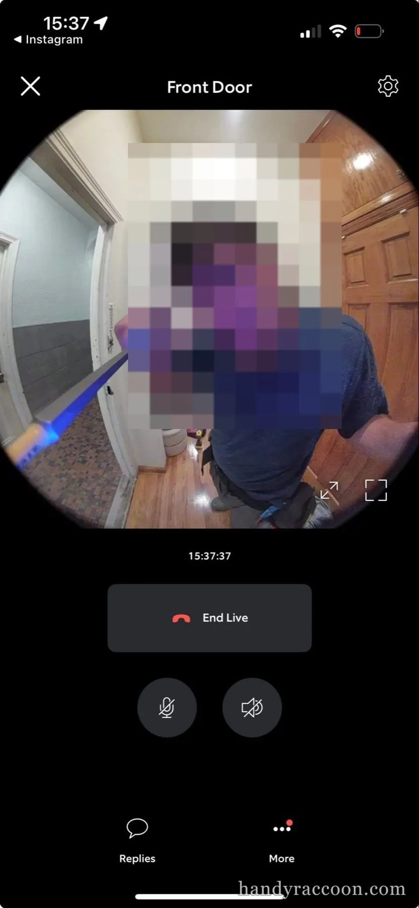 Phone screenshot of a video doorbell app live view showing a person in a hallway holding a tool.